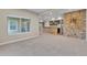 Spacious finished basement with stone bar, offering plenty of living area at 9754 W Ontario Pl, Littleton, CO 80128