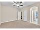 Empty bedroom featuring neutral carpet and access to multiple doorways at 9754 W Ontario Pl, Littleton, CO 80128