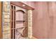 Unique wine rack with stone trim, providing ample storage at 9754 W Ontario Pl, Littleton, CO 80128