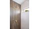 Contemporary shower featuring gold fixtures, and textured tile surround at 3065 S Eudora St, Denver, CO 80222