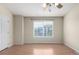 Bedroom with wood floors, ceiling fan, and a view from the window at 19240 E Carolina Dr # 104, Aurora, CO 80017