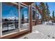 Deck featuring large windows with mountain views at 160 N Fuller Placer Rd, Breckenridge, CO 80424