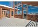 Large wooden deck with access to the home features gorgeous views of the mountains at 160 N Fuller Placer Rd, Breckenridge, CO 80424