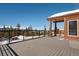 Spacious wooden deck showcases mountain views and contemporary railings at 160 N Fuller Placer Rd, Breckenridge, CO 80424