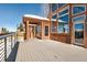 Scenic exterior deck with architectural windows offers panoramic mountain views at 160 N Fuller Placer Rd, Breckenridge, CO 80424