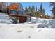 Stunning home with a balcony and a garage, surrounded by snow at 160 N Fuller Placer Rd, Breckenridge, CO 80424
