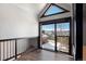 A scenic mountain view from an indoor staircase with hardwood floors at 160 N Fuller Placer Rd, Breckenridge, CO 80424