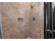 A tiled shower with a built-in niche and a rainfall showerhead at 160 N Fuller Placer Rd, Breckenridge, CO 80424