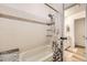 Shower and tub in bathroom with tile and shower curtain at 3803 Dyanna Dr, Thornton, CO 80241