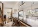 Bright kitchen with a vaulted ceiling, stainless steel appliances, and island counter with seating at 3803 Dyanna Dr, Thornton, CO 80241