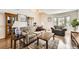 Bright living room showcasing hardwood floors, a comfortable sofa, and natural light from a bay window at 3803 Dyanna Dr, Thornton, CO 80241
