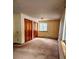 Spacious bedroom with closet and window, carpeted, ready for personalization at 3841 Myers Gulch Rd, Kittredge, CO 80457