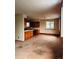 Open dining room area with dark wood cabinets at 3841 Myers Gulch Rd, Kittredge, CO 80457