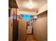 Laundry room with shelving and a washer and dryer at 3841 Myers Gulch Rd, Kittredge, CO 80457