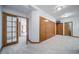 Large bedroom with a full wall of closets and views of other rooms at 2049 Silverheels Dr, Larkspur, CO 80118