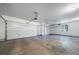 Spacious three car garage with automatic doors and ample room for storage or hobbies at 2049 Silverheels Dr, Larkspur, CO 80118