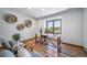 Bright office space with a large window, hardwood floors, and contemporary decor at 2049 Silverheels Dr, Larkspur, CO 80118