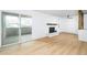 Bright living room with hardwood floors and access to a balcony at 3035 Oneal Pkwy # 20V, Boulder, CO 80301