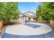 A backyard featuring a basketball court, perfect for recreation and enjoying outdoor activities with Gathering and friends at 7703 S Grape Ct, Centennial, CO 80122