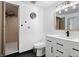 Modern bathroom featuring a walk-in shower, sleek vanity with stylish fixtures, and contemporary design elements at 7703 S Grape Ct, Centennial, CO 80122