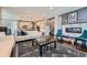 Spacious living area featuring a modern fireplace, hardwood floors, and cozy decor at 10178 Nadine Ave, Parker, CO 80134