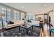 Open concept living area with hardwood floors, and seamless flow into other spaces at 10178 Nadine Ave, Parker, CO 80134