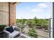Relaxing balcony with comfortable seating and a pleasant view of the neighborhood at 1610 Little Raven St # 302, Denver, CO 80202