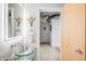 Contemporary bathroom featuring a unique glass vessel sink and minimalist décor at 1610 Little Raven St # 302, Denver, CO 80202