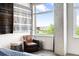 Reading nook with view featuring exposed piping, a leather chair and modern style at 1610 Little Raven St # 302, Denver, CO 80202