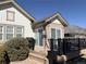 Inviting deck area with outdoor seating and a grill, ideal for entertaining at 8338 E 148Th Way, Thornton, CO 80602