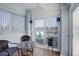 Inviting sunroom with comfortable seating and views of the outdoor living space at 8338 E 148Th Way, Thornton, CO 80602