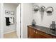 Hall bath features stylish accents, a granite countertop, and tiled floors at 681 W Burgundy St # A, Highlands Ranch, CO 80129