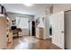 Functional home office with hardwood floors, built-in desk, and ample storage space at 7087 Sapphire Pointe Blvd, Castle Rock, CO 80108