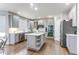 Modern kitchen with stainless steel appliances, center island, and sleek cabinetry at 7087 Sapphire Pointe Blvd, Castle Rock, CO 80108