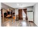 A large bedroom with a four-poster bed, ceiling fan, and lots of natural light at 7087 Sapphire Pointe Blvd, Castle Rock, CO 80108