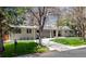Charming exterior featuring a well manicured lawn, mature trees and welcoming walkway at 3901 S Dexter St, Cherry Hills Village, CO 80113