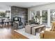 Bright living room area with fireplace, hardwood floors, stylish decor and furniture at 3901 S Dexter St, Cherry Hills Village, CO 80113