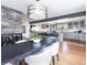 Spacious living room with an open concept floor plan featuring stylish finishes and modern design at 3901 S Dexter St, Cherry Hills Village, CO 80113
