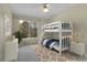 Digitally Staged Bedroom with a bunk bed, carpeted floors and a standard window at 1311 S Kingston St, Aurora, CO 80012