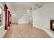 Spacious living area with hardwood floors, bright lighting, and vaulted ceilings at 1311 S Kingston St, Aurora, CO 80012