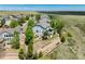 Aerial view of a home with terraced landscaping and neighborhood at 7852 Solstice Way, Castle Rock, CO 80108
