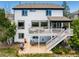 Large two-story home featuring a spacious back deck at 7852 Solstice Way, Castle Rock, CO 80108