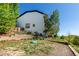 Spacious backyard featuring attractive terraced landscaping at 7852 Solstice Way, Castle Rock, CO 80108