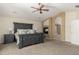Spacious main bedroom includes a fireplace, neutral carpeting and an ensuite bathroom at 7852 Solstice Way, Castle Rock, CO 80108