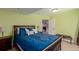 Bedroom with queen bed, hardwood frame, and a view to the rest of the home at 7852 Solstice Way, Castle Rock, CO 80108