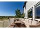 Inviting outdoor deck with comfortable seating and scenic neighborhood views at 7852 Solstice Way, Castle Rock, CO 80108