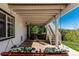 Outdoor patio with comfortable seating, a swing and scenic views at 7852 Solstice Way, Castle Rock, CO 80108