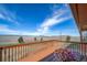 Back deck offers relaxing area and a great view of the surrounding countryside at 12973 Mesa View Rd, Larkspur, CO 80118
