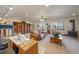 Full finished basement with treadmill, craft and media areas with great natural light at 12973 Mesa View Rd, Larkspur, CO 80118