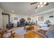 Basement with media area, desk, wood-burning stove, and comfortable furnishings at 12973 Mesa View Rd, Larkspur, CO 80118